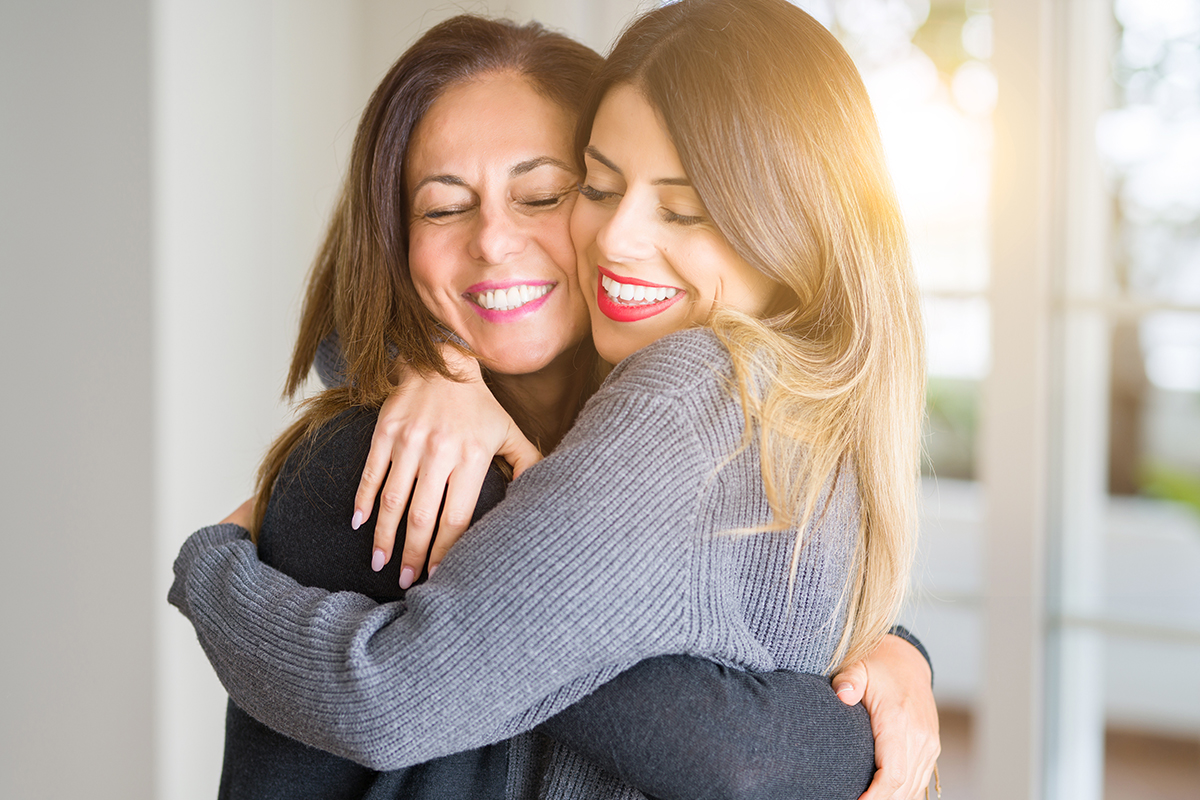 woman-hugging-happily